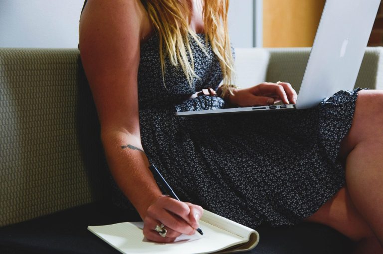 student learning how to write a cover letter on a laptop